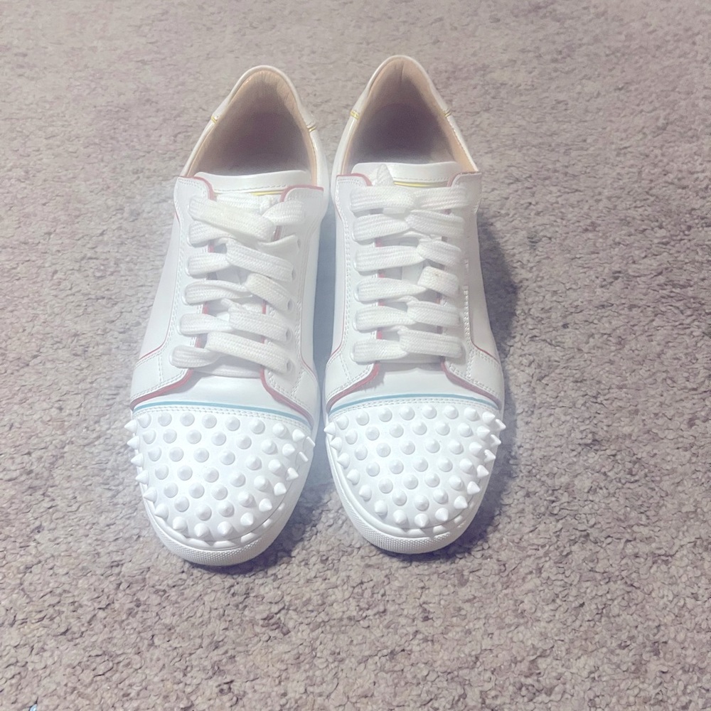 Louboutin sneaker very cute! Goes with pretty much any outfit!